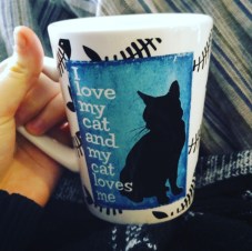 Black cat coffee mug